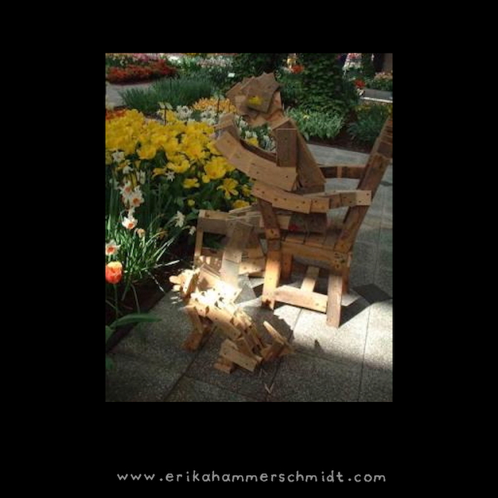 Straw man fallacy - illustrated by a wooden sculpture of a person and dog I saw in the Keukenhof garden in the Netherlands