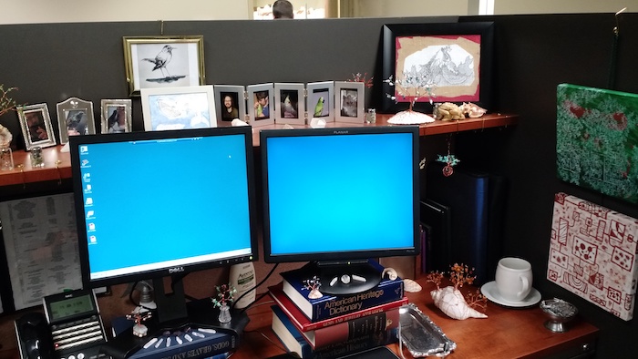 My desk covered in decorations. 